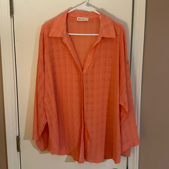 new in Tops - Peach colored women’s shirt